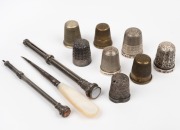 Two antique silver retractable pencils, assorted silver and metal thimbles and a broaching tool, 19th and 20th century, (11 items).