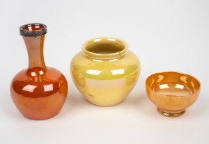 MOORCROFT miniature yellow lustre glazed pottery vase together with an orange lustre glazed salt cellar and a vase with silver rim, (3 items), factory marks to the bases, the largest 9.5cm high.