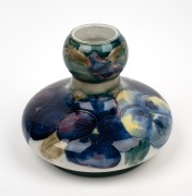 MOORCROFT "Pansy" early pottery vase on celadon and cream ground, note rare shape, impressed "MOORCROFT, BURSLEM, ENGLAND", with underglazed blue signature mark, ​​​​​​​10cm high, 11cm diameter.
