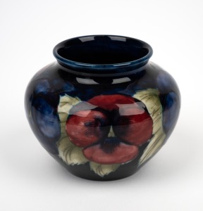 MOORCROFT "Pansy" pottery vase on blue ground, impressed "MOORCROFT, MADE IN ENGLAND", 8cm high, 11cm diameter.