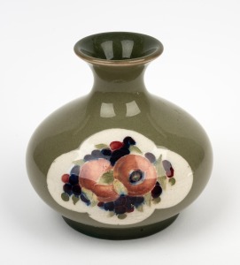 MOORCROFT "Pomegranate and Berries" pottery vase on early celadon ground, impressed "Moorcroft, England, Burslem" with green signature mark, 8.5cm high.