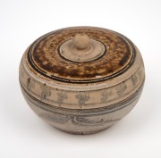 Sawankhalok ware lidded pot, Thailand, 15th/16th century, 8.5cm high, 10cm diameter. ​​​​​​​PROVENANCE: The Rod Thomas Collection, Melbourne.