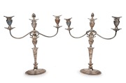 A pair of English silver plated three branch candelabra, 20th century, ​​​​​​​48cm high, 43cm wide.
