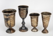 Three antique Russian silver vodka cups, together with an English sterling silver example, 19th/20th century, (4 items), ​​​​​​​the largest 9.5cm high, 117 grams total.