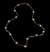 A 14ct gold and cultured pearl necklace, 20th century, 42cm long, 7.6 grams total including pearls.