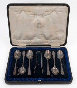 84 · A vintage set of six sterling silver coffee spoons and a pair of sugar tongs, by Cooper Brothers & Sons, Sheffield, 1917, in original plush-lined presentation box; retailed by James Hardy & Co., Aberdeen. (66 grams).