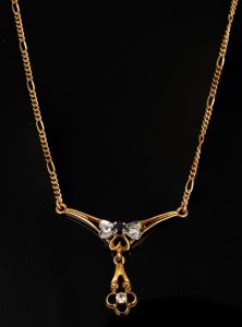 A 14ct gold and sapphire necklace, 20th century, stamped "585", 37cm long, 6.2 grams total.