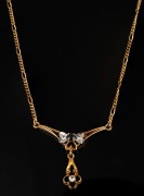 A 14ct gold and sapphire necklace, 20th century, stamped "585", 37cm long, 6.2 grams total.