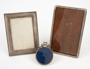 Three antique and vintage sterling silver picture frames, early 20th century, the largest 20 x 13cm overall.