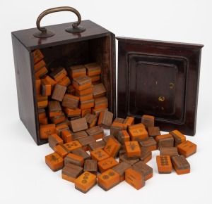 A vintage Mah Jong set in original timber case, early 20th century, the case 19cm high.