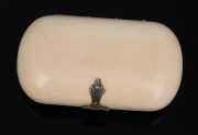 An antique ivory coin purse with blue silk interior, 19th century, ​​​​​​​7.5cm wide. - 2