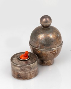Two designer silver plated trinket boxes, one with orange bakelite finial in the form of a light switch with maker's mark stamped "HAMISH", 20th century, 5cm and 10cm high.