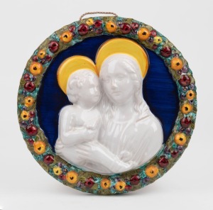 GRAZIA DERUATA Italian circular pottery plaque of the Virgin Mother and Child with majolica glazed finish, 20th century, signed "Grazia Deruta", 24.5cm diameter.