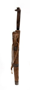 An Algerian Flissa Berber dagger in carved wooden scabbard, 19th/20th century, ​​​​​​​29cm long overall.