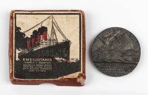 LUSITANIA cast bronze medal (55mm), housed in original card box of issue with lithograph top depicting a portrait of the ill-fated ship "R.M.S. LUSITANIA, Cunard Line 32,000 Tons. Sunk On Her Journey From The United States By A German Submarine, May 7th 1