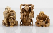 Three Japanese carved ivory netsuke and okimono, 20th century, ​​​​​​​the largest 6cm high.