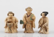 Three Japanese carved ivory netsuke in female form, 20th century, ​​​​​​​the largest 6cm high.