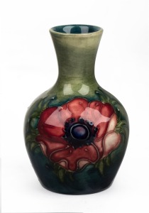 MOORCROFT "Anemone" miniature pottery stem vase on celadon green ground, impressed "Moorcroft, Made In England", 9.5cm high.