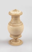 An antique Anglo-Indian ivory pepper pot, 19th century, ​​​​​​​8.5cm high.
