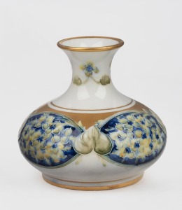 MOORCROFT "Lilac" pattern pottery vase on cream ground with gilt highlights, stamped "MACINTYRE, Burslem, England" with green signature "W. Moorcroft", ​​​​​​​8.5cm high.