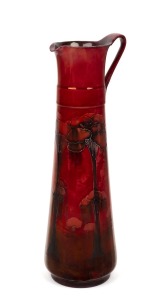 MOORCROFT "Hazeldene" ruby lustre pottery ewer, signed "W. Moorcroft" 31cm high.