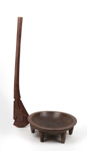 A carved timber rifle stock club and a kava, Fijian origin, 20th century, (2 items), the club 102cm long.
