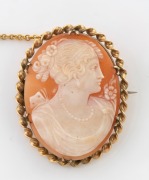 A 9ct gold mounted carved cameo portrait brooch, 19th/20th century, stamped "9ct", 3.3cm high overall, 6.5 grams total.