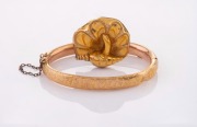 An antique 15ct gold brooch (4.8 grams), together with a 9ct gold bangle (9.6 grams), housed in an antique plush jewellery case branded "J.M. WENDT, ADELAIDE", 19th century, (3 items including the case).