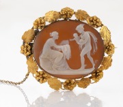A fine quality antique cameo brooch with scene of Hermes and Dionysus (Mercury and Bacchus), mounted in 18ct yellow gold, accompanied with a letter of provenance, 19th century, ​​​​​​​5.5cm wide, 13.7 grams total including cameo.