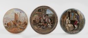 Three antique English Prattware pot lids, mid 19th century, the largest 12cm diameter.