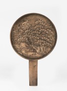 A Japanese bronze hand-mirror, 19th/20th century, 23cm high.