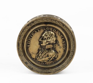 ADMIRAL LORD NELSON commemorative brass circular box, bearing portrait top and inscription verso, 2.5cm high, 7.3cm diameter.