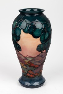 MOORCROFT "Mamora" English pottery vase, designed by Sally Tuffin, factory mark and details to base, with additional signature of John Moorcroft, 31cm high.