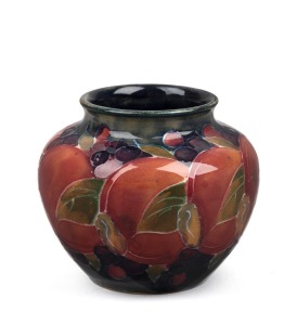 MOORCROFT "Pomegranate" pottery vase, stamped "Moorcroft, Burslem, England" with green monogram "W.M.", 6cm high, 8cm diameter.