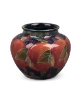 MOORCROFT "Pomegranate" pottery vase, stamped "Moorcroft, Burslem, England" with green monogram "W.M.", 6cm high, 8cm diameter.