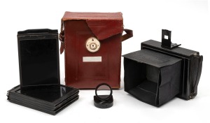 ZEISS IKON: "Ideal 250/7" folding plate camera, c. 1927, with Carl Zeiss Jena Tessar 150mm f4.5 lens; offered in leather case with lens filter and additional slides.