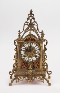 453 · An Italian brass mantle clock with time and strike movement, 20th century, 34cm high.