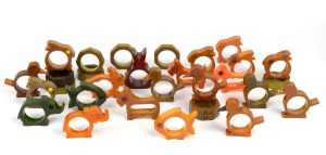 A collection of vintage bakelite novelty napkin rings, circa 1930, (29 items).
