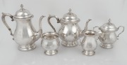 An American sterling silver five piece tea and coffee service, 20th century, ​​​​​​​the largest 26cm high, 2524 grams total.