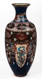 An antique Chinese cloisonne mantle vase, adorned with phoenix decoration and geometric motifs, 19th/20th century, 46.5cm high.