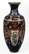 An antique Chinese cloisonne mantle vase, adorned with phoenix decoration and geometric motifs, 19th/20th century, ​​​​​​​46.5cm high.