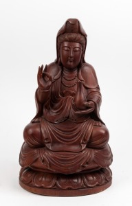 261 · A Chinese carved wooden seated Guanyin statue, 20th century, 48cm high.