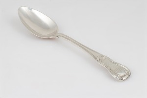 16 · An antique Irish silver Queen's pattern spoon by Thomas Townsend, 18cm long, 52 grams.