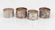 A pair of Chinese export silver napkin rings with repousse dragon decoration, together with two antique English sterling silver napkin rings 19th/20th century, (4 items), ​​​​​​​99 grams total.