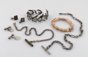 An antique gold plated silver bangle, a sterling silver bangle with leaf decoration, two pairs of antique sterling silver cufflinks, and two watch chains, 19th/20th century, (6 items).