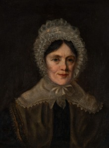An antique portrait of a Matron lady wearing a lace bonnet, oil on artist board in period water gilt frame. Pencil inscription to verso "J. Williams, Belgium Consulate ....", early 19th century, 38 X 30cm, 51 x 44cm overall.