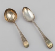 An antique sterling silver tablespoon and ladle with feather-edged decoration, 19th century, (2 items), 18cm and 21cm long, 98 grams total.