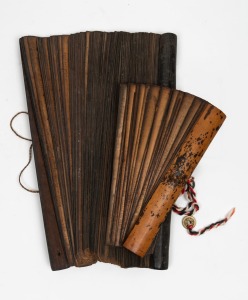 Two antique religious texts, hand-written on bamboo, Southeast Asian origin, 19th/20th century, the larger 40cm wide.