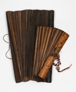 Two antique religious texts, hand-written on bamboo, Southeast Asian origin, 19th/20th century, ​​​​​​​the larger 40cm wide.