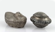 An Eastern silver betel box, together with a Laotian coin silver zoomorphic box, (2 items), 8cm and 10cm wide, 206 grams total.